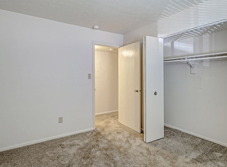 Bedroom with Spacious Closet at Thompson Village Apartments